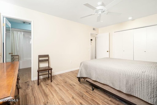 bedroom featuring ceiling fan, a closet, and light hardwood / wood-style floors