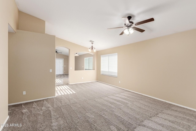 carpeted empty room featuring ceiling fan