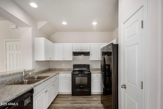 kitchen with under cabinet range hood, a sink, black appliances, and white cabinetry