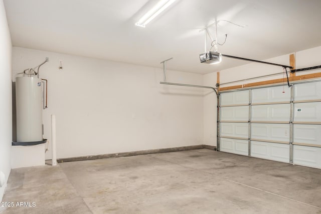 garage with baseboards, a garage door opener, and gas water heater