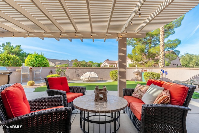 view of patio featuring an outdoor living space and a pergola