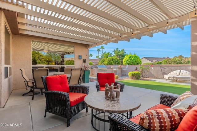 view of patio with a pergola, area for grilling, and an outdoor hangout area