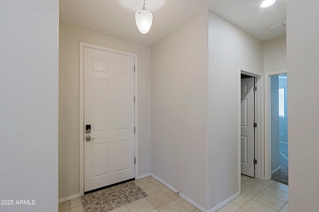 view of tiled foyer entrance