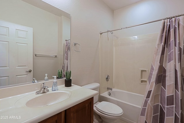 full bathroom featuring toilet, vanity, and shower / tub combo