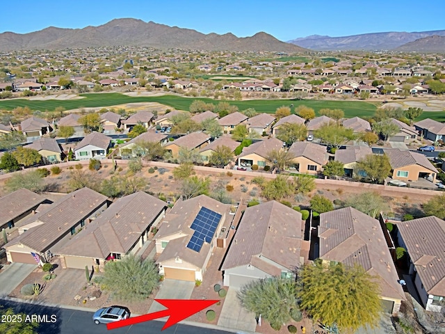 drone / aerial view featuring a mountain view