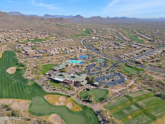 birds eye view of property featuring a mountain view