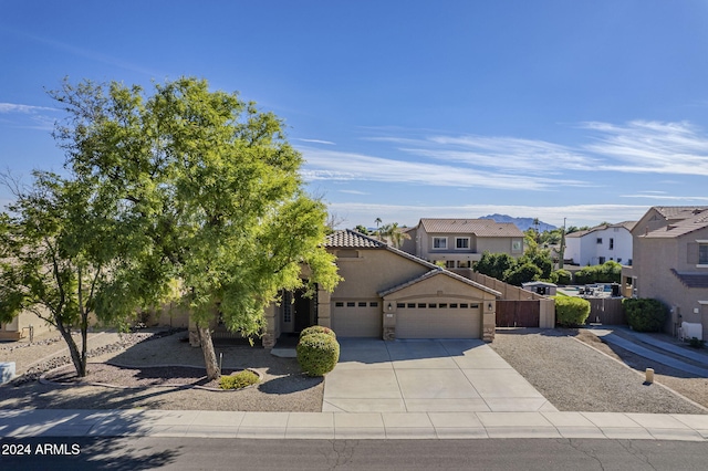 view of front of home with a garage