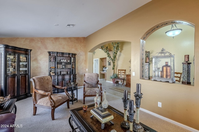 living area featuring carpet flooring