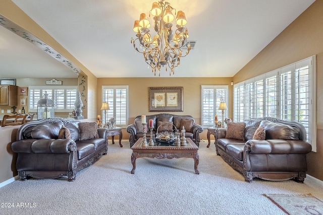 carpeted living room featuring an inviting chandelier, vaulted ceiling, and a healthy amount of sunlight