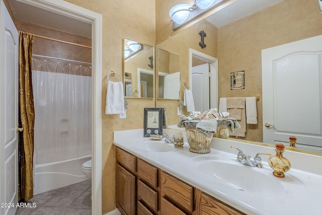 full bathroom with vanity, shower / bath combo with shower curtain, tile patterned flooring, and toilet