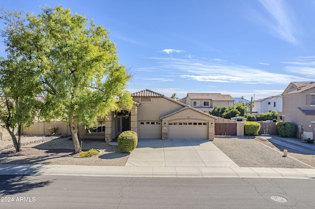 view of front of home with a garage