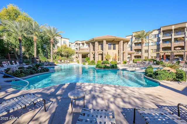 view of swimming pool featuring a patio