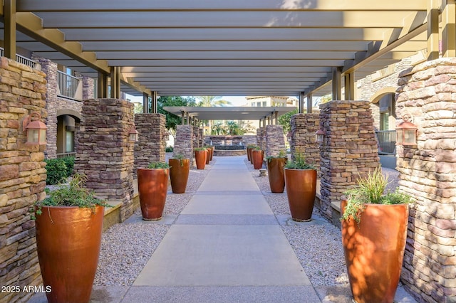 view of patio featuring a pergola