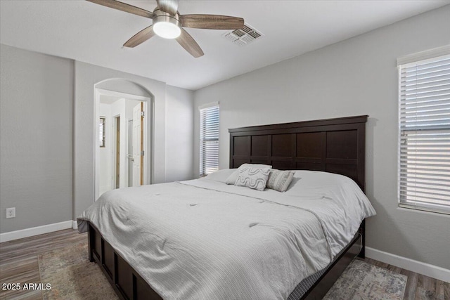 bedroom featuring wood-type flooring and ceiling fan