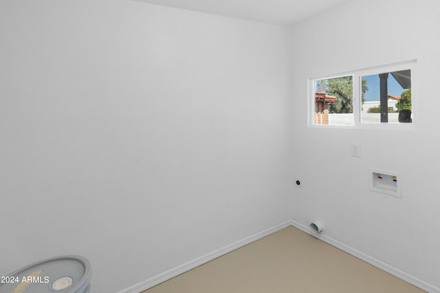 clothes washing area featuring electric dryer hookup and hookup for a washing machine