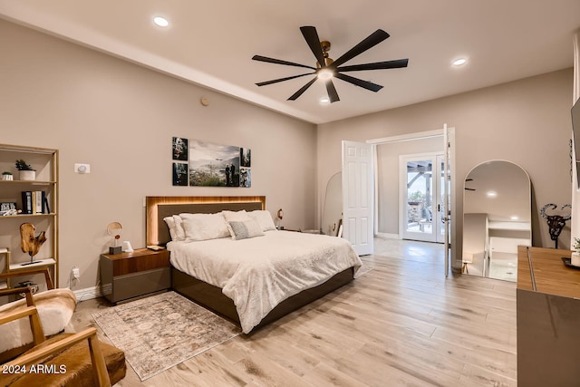 bedroom with access to outside, light hardwood / wood-style flooring, and ceiling fan