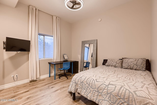 bedroom with light wood-type flooring