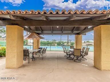 view of patio / terrace with a water view