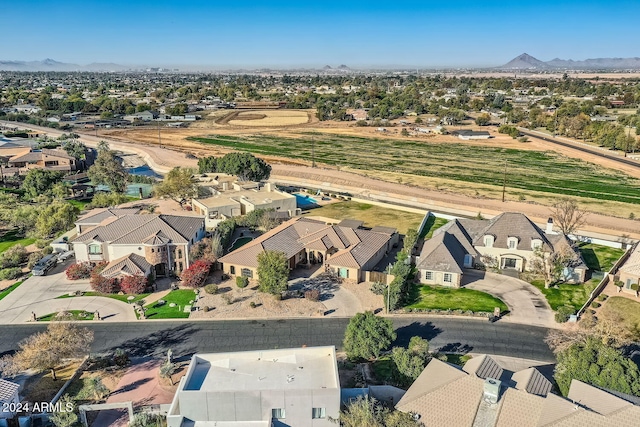 birds eye view of property featuring a mountain view