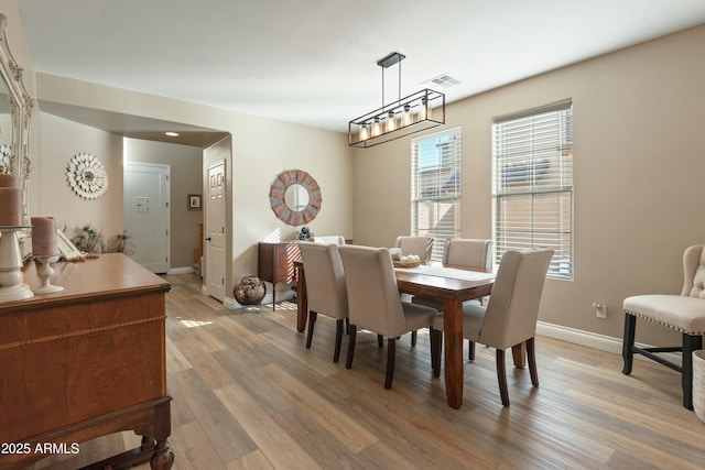 dining area featuring light hardwood / wood-style flooring