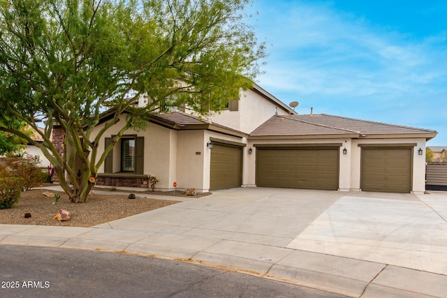 view of front of home with a garage