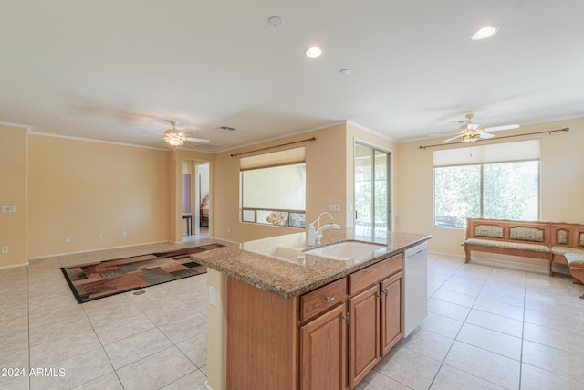 kitchen with a sink, dishwasher, and ornamental molding