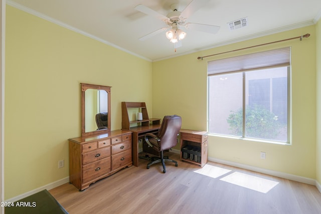 office with crown molding, baseboards, visible vents, and light wood-type flooring