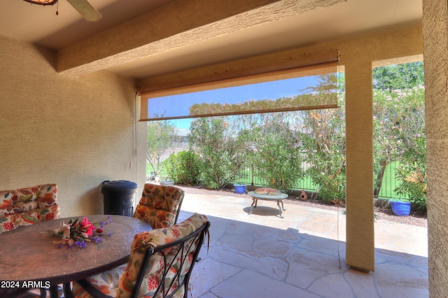 view of patio / terrace featuring outdoor dining space and fence