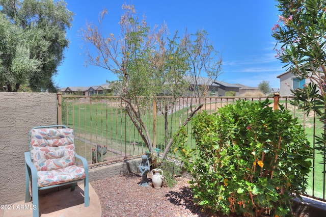 view of yard with a residential view and fence