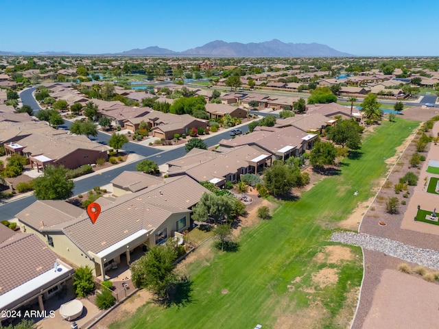 drone / aerial view featuring a residential view and a mountain view