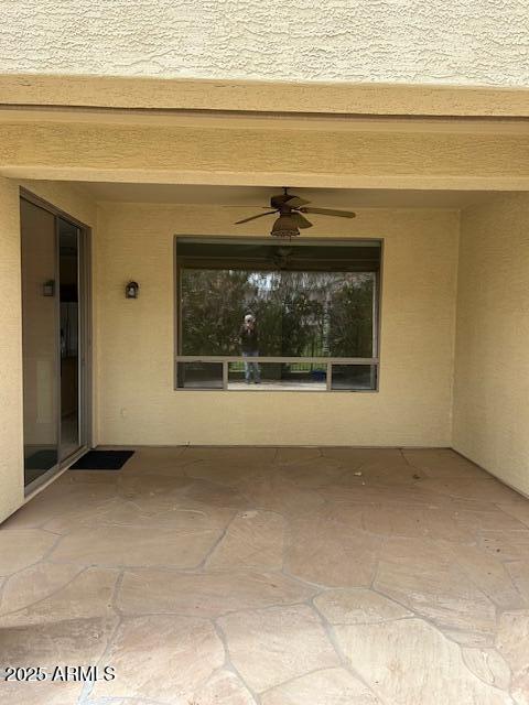 view of patio / terrace with ceiling fan