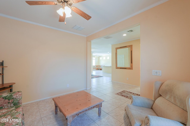 living room with ornamental molding, light tile patterned flooring, and visible vents