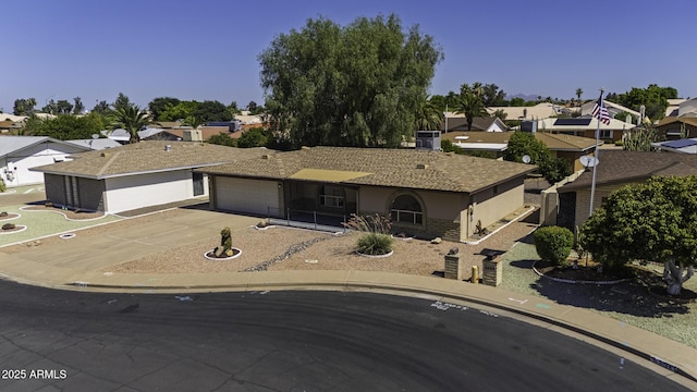 5148 E Edgewood Cir, Mesa, AZ 85206 - single story home with concrete driveway, a garage, a residential view, and stucco siding