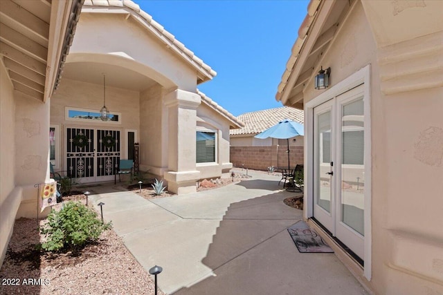 view of patio featuring french doors