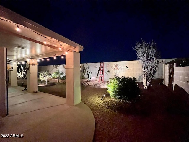 view of patio at night