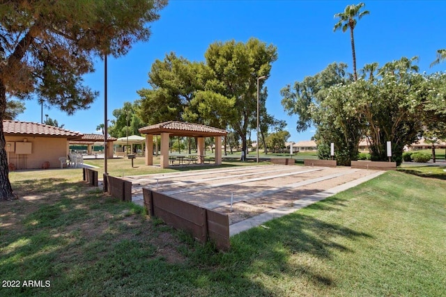 surrounding community featuring a gazebo and a yard