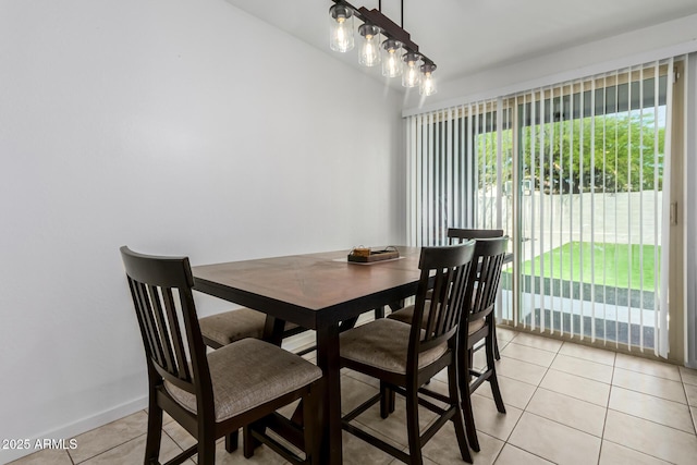 dining space with light tile patterned flooring