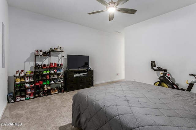 bedroom with ceiling fan and carpet