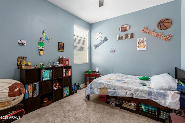carpeted bedroom with ceiling fan
