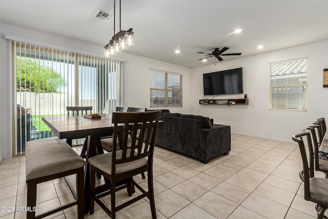 dining area featuring ceiling fan, visible vents, baseboards, light tile patterned flooring, and recessed lighting