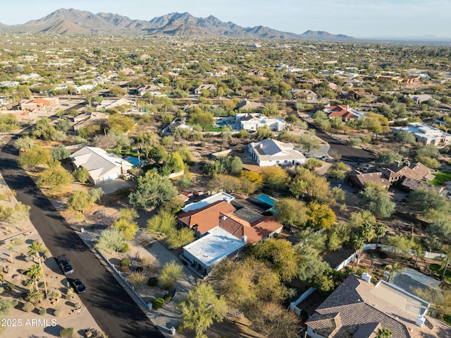 drone / aerial view with a residential view and a mountain view