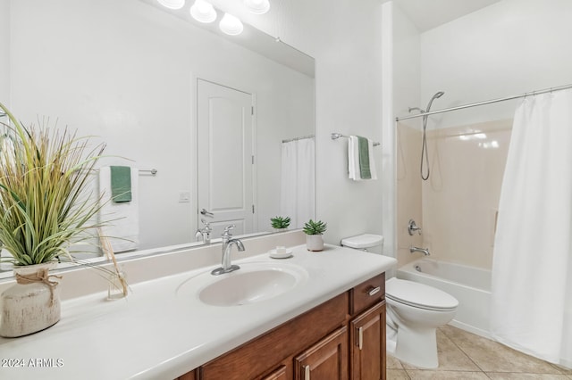 full bathroom featuring tile patterned floors, toilet, shower / tub combo with curtain, and vanity