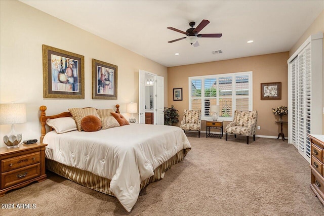 carpeted bedroom featuring ceiling fan