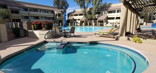 view of pool featuring a pergola