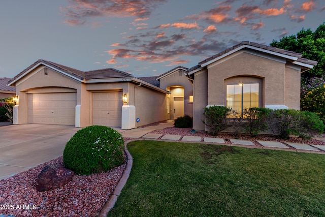 4215 W Hackamore Dr, Phoenix, AZ 85083 - view of front of home featuring stucco siding, a garage, driveway, a front yard, and a tile roof