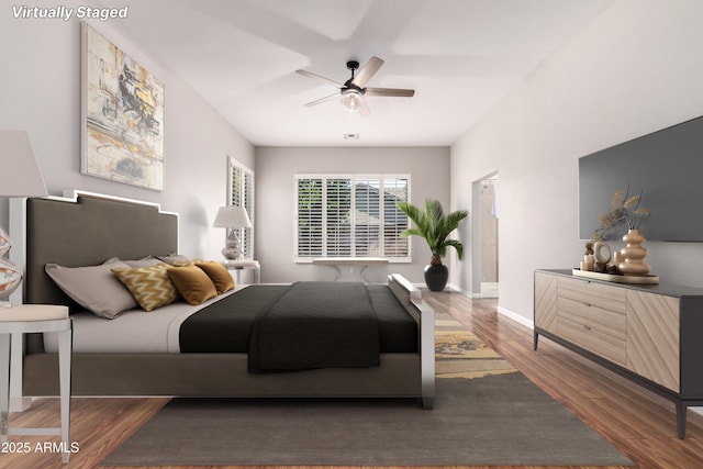 4215 W Hackamore Dr, Phoenix, AZ 85083 - bedroom featuring wood finished floors, a ceiling fan, and baseboards
