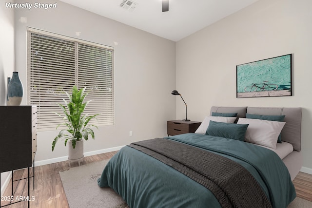 4215 W Hackamore Dr, Phoenix, AZ 85083 - bedroom featuring wood finished floors, baseboards, and ceiling fan