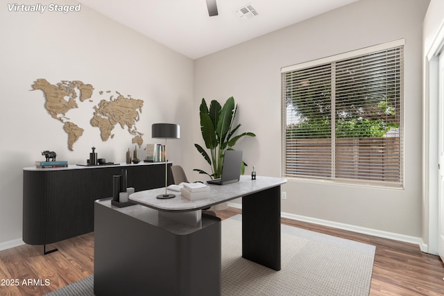 4215 W Hackamore Dr, Phoenix, AZ 85083 - home office with wood finished floors, ceiling fan, and baseboards