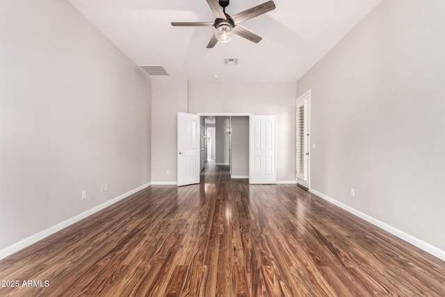 4215 W Hackamore Dr, Phoenix, AZ 85083 - unfurnished room featuring a ceiling fan, baseboards, and dark wood-style flooring