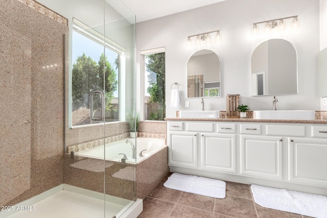 4215 W Hackamore Dr, Phoenix, AZ 85083 - full bathroom with double vanity, a garden tub, a stall shower, and tile patterned flooring